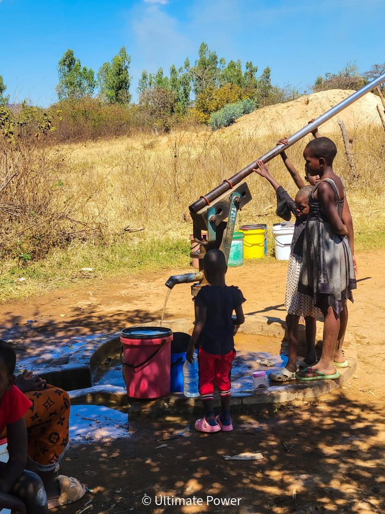 Traditional bush pump converted to solar borehole pumping system in Zimbabwe by Ultimate Power